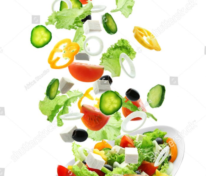 stock-photo-sliced-vegetables-falling-into-bowl-with-salad-on-white-background-756101677